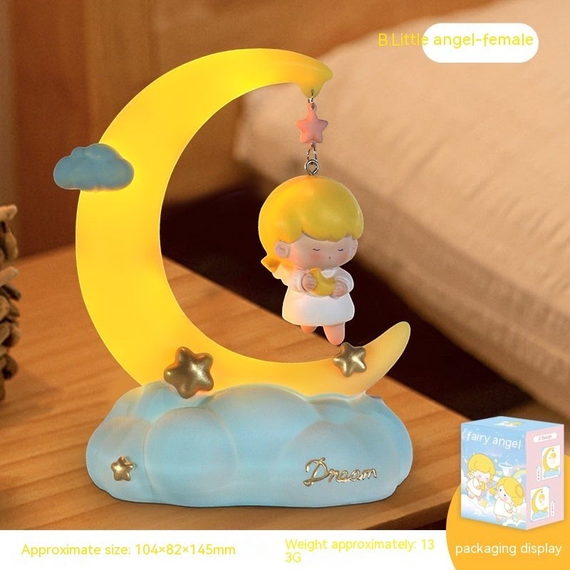 LX EMPIRE Little angel female night light with moon, stars, and clouds. Resin and plastic construction.