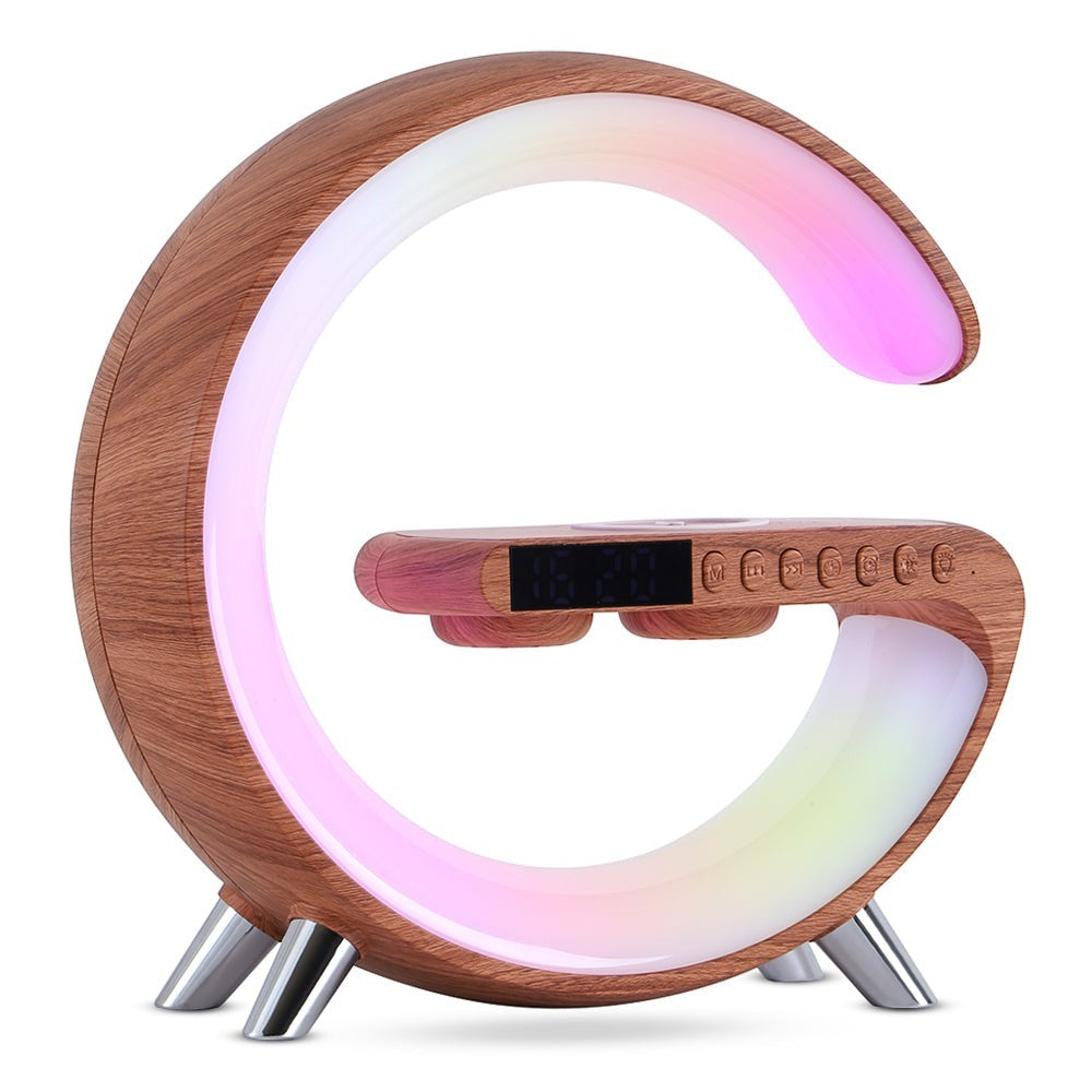 LX EMPIRE G-shaped lamp with wood finish, RGB lighting, digital clock, and wireless charger. Modern desk decor.