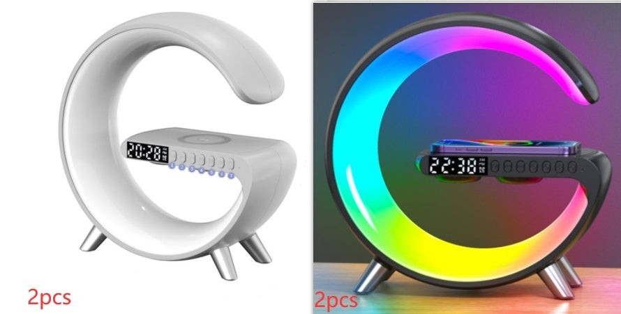 LX EMPIRE G-shaped LED lamp with Bluetooth speaker, wireless charger, and digital clock. Available in white and black.