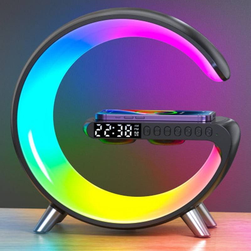 LX EMPIRE G-shaped RGB atmosphere lamp with wireless charger, Bluetooth speaker, and digital clock display.