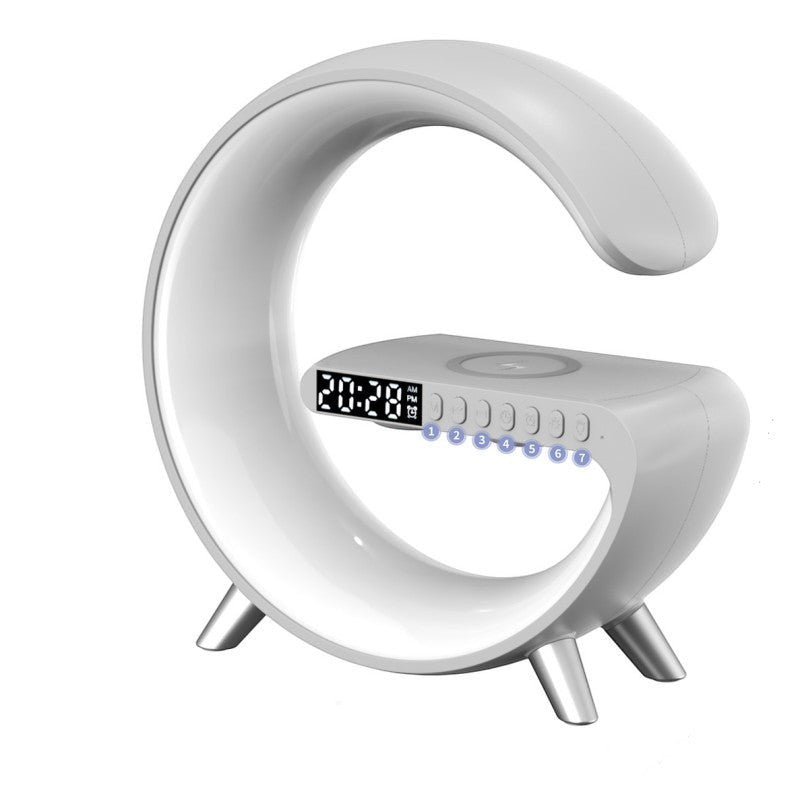 LX EMPIRE G-shaped white smart lamp with Bluetooth speaker, wireless charger, and digital clock display.