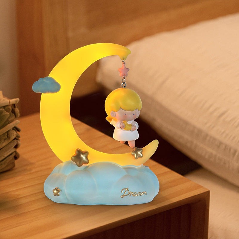 LX EMPIRE Good Night Little Angel night light with a girl sitting on a crescent moon holding a star.