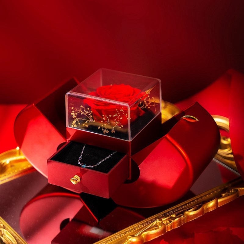LX EMPIRE red apple-shaped jewelry box with preserved rose and silver necklace inside. Perfect gift.