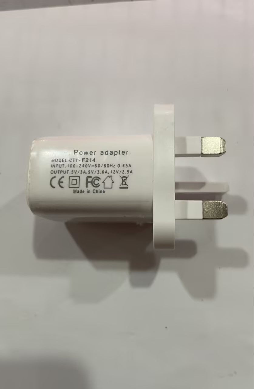 LX EMPIRE white UK power adapter with 3 pins, CE, FC, and house symbols. Model CTY-F214.