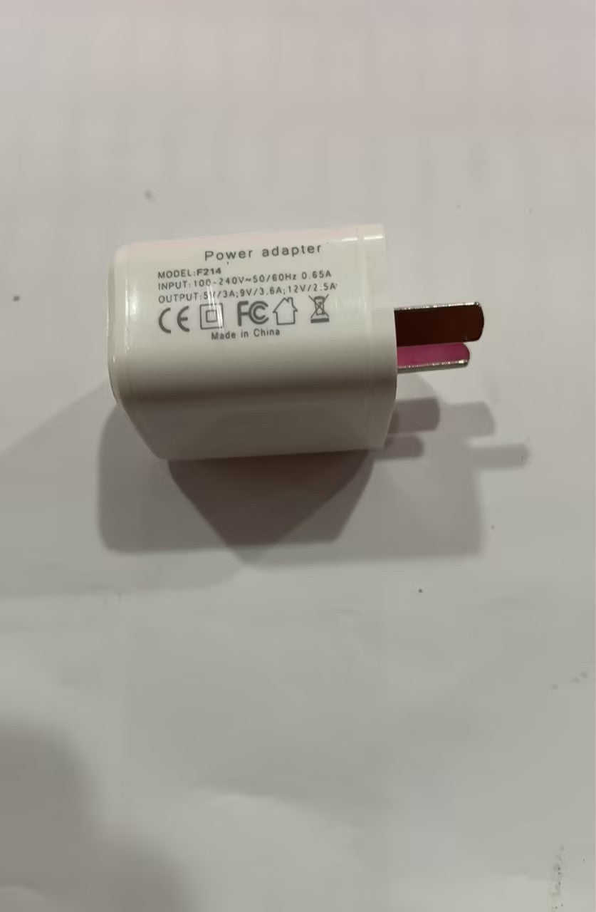LX EMPIRE white power adapter with UK plug, 100-240V input, 0.65A, and multiple output options.
